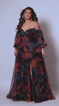 Plus Size Floral Maxi Dress with Sleeves | Sydney's Closet SC7386 Satin Dresses On Plus Size, Long Dress Formal Plus Size A Line, Evening Dresses Elegant Curvy, Black Tie Dress Code Women Plus Size, Haute Couture, Fall Wedding Plus Size Guest, Plus Size Floral Gown, Plus Size Grad Dresses, Dresses For Thicker Women