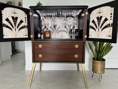 an art deco cabinet with wine glasses in it