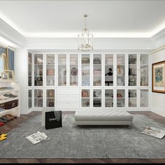 a living room filled with lots of white furniture