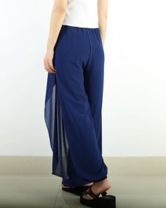 * Beautiful pearl chiffon pants, very comfortable to wear, not easy to get wrinkled, very easy to take care of.* Add an asymmetric layer on the front, very unique and beautiful.* Material: outer-pearl chiffon, lining-100% polyesterCustom made to fit, lead time is 6-8 days;Let us know your usual size in your country and your overall height.If you have some specific request or special characters such as broad shoulder, long arms, long waist, etc you think we need pay attention to when making, do l Elegant Wide Leg Beach Trousers, Versatile Full Length Summer Wide Leg Pants, Elegant Summer Wide Leg Beach Pants, Versatile Full Length Wide Leg Pants For Summer, Versatile Summer Wide Leg Pants Full Length, Summer Evening High-waisted Wide Leg Pants, Blue Wide Leg Pants For Summer Party, Summer Chic Baggy Harem Pants, Elegant Beach Pants With Elastic Waistband