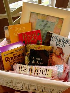 a basket filled with lots of books on top of a table