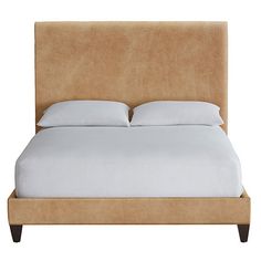 a bed with white sheets and pillows on it's headboard, against a white background