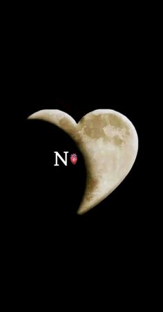 the moon is in the shape of a heart, with an n on it's side