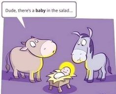 a baby in a manger with two donkeys and a cow next to it