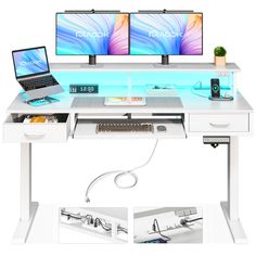 two computer monitors sitting on top of a white desk