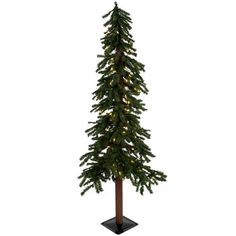 a tall christmas tree with lights on it's branches and a black stand in front of a white background