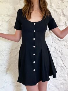 A cute and flouncy fit and flare dress! Button down in mother of pearl. This one is a thicker, slightly stretchy black rayon. All our fabrics are upcycled deadstock. Dry clean only. Kibbe Romantic Outfits, Black Flowy Dress, Kibbe Romantic, A Line Mini Dress, The Flare, Romantic Outfit, Dry Clean Only, Flowy Dress, Fit Check