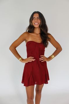 Our Scarlet Mini Dress is a deep red, scarlet pinstriped strapless mini dress. Featuring a flattering sweetheart neckline and open back. size recommendations: - runs small. If you are in between sizes, take the larger size. - model is wearing size small. Elevated Basics, Home Dress, Strapless Mini Dress, Deep Red, Sale House, Sweetheart Neckline, Modern Woman, Scarlet, Jumpsuit Dress