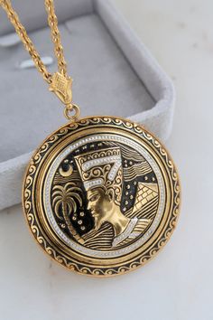 Vintage Spain Damascene Egyptian Revival Pharaoh Pendant Necklace. Diameter: 1 1/2" Length: 18 1/2" Vintage condition! new old stock. For more necklaces: https://www.etsy.com/shop/SusVintage?section_id=14148238 Back to the shop: https://www.etsy.com/shop/SusVintage?ref=hdr_shop_menu Don't hesitate to contact me if you have any further questions. Thank you for looking!! Historical Jewellery, Egyptian Jewelry, Egyptian Revival, Pyramid, Pendant Necklaces, Necklace Etsy, Jewelry Necklace Pendant, Spain, Jewelry Necklaces