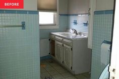 a bathroom with blue tile and white walls