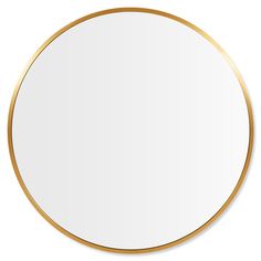 a round mirror with gold rim on a white background