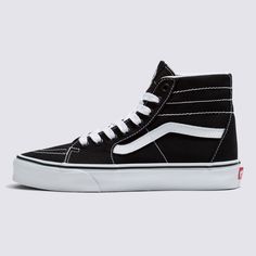 A Slender Take on Our Iconic High-Top ShoeOur legendary high-top shoe gets slimmed down with a deconstructed upper in the Sk8-Hi Tapered. With a more slender fit than the original Sk8-Hi, this laid-back take on an icon offers a streamlined look with plenty of style. Legendary high-top, Sidestripe™ shoe Slender silhouette Deconstructed canvas uppers Lace-up closure Metal eyelets Signature rubber waffle outsoles | Vans Sk8-Hi Tapered Canvas Shoes (Black/True White) - 5.5 Boys/7.0 Women Vans Toddler, Vans Store, High Top Shoe, Vans Kids, Black And White Shoes, White Vans, Vans Sk8 Hi, High Top Vans, Black High Tops