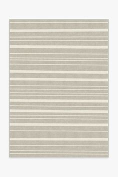 a beige and white striped rug