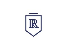 the letter r in a shield with an arrow on it's side, as well as