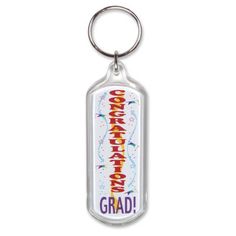 a key chain with the words congratulations grad on it