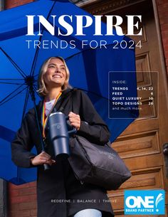 the cover of inspire magazine features a woman holding an umbrella and smiling at the camera