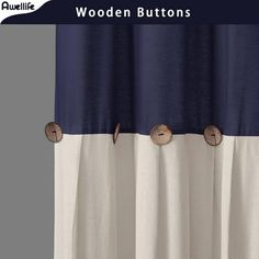 two buttons are attached to the curtain