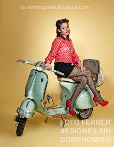 a woman is sitting on top of a moped