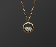 "This unisex customizable cremation ash locket is new to our collection of fill-at-home cremation pieces. Your purchase includes the gold toned locket, gold toned chain, and opal color of your choice and does not require mailing the ashes. It is composed of sturdy glass and gold-toned stainless steel (hypoallergenic, scratch/tarnish resistant). The chain is 32\". If screwed properly, the locket is air and watertight. The round pendant measures 25mm across and is the perfect size for a classy and Ash Pendant Cremation Jewelry, Necklace For Ashes, Ashes Necklace Cremation Jewelry, Diy Urns For Ashes, Jewelry With Ashes, Cremation Ashes Ideas, Gold Cremation Necklace, Urn Necklaces For Ashes, Thumbprint Jewelry