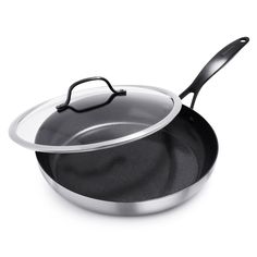 an empty frying pan on a white background