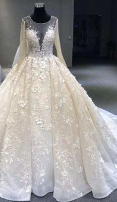 a wedding dress on display in a store