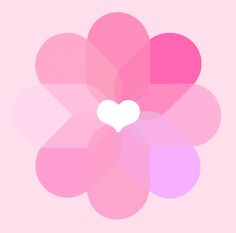 a pink flower with a white heart on it