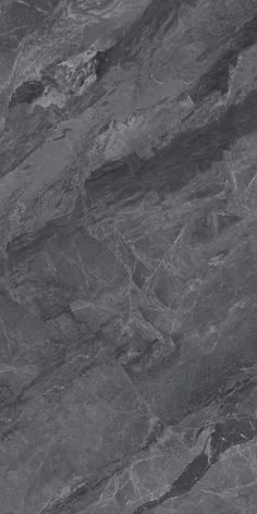 a black and white photo of the surface of a mountain with no snow on it