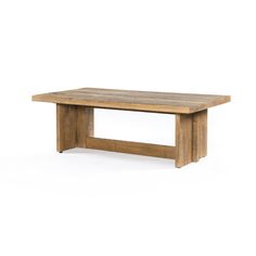 a wooden table sitting on top of a white floor