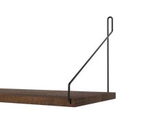 a wooden shelf with two black metal hooks on the top and one is hanging from it's side