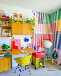 an office with colorful walls and furniture