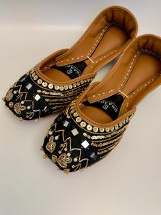 dhaage.london We Bring you our latest collection. These beautiful khussas/Juttis are handcrafted, incredibly soft and anti-slip sole. This will give you Comfort and style all in one!  Colour: Black Please note that these khusseh are made from real leather and they will loosen ever so slightly after the first wear. Please note, they will feel tight or snug at first.   . #jutti #khussa #shoes #punjabishoes #juttilovers #summer #desiclothes #casualshoes #indian #pakistani #desi #fashion #desifashio Party Flats With Mirror Work For Festivals, Festive Flats For Navratri, Traditional Flats For Diwali Party, Diwali Party Flats With Gota Work, Festive Mirror Work Closed Toe Flats, Bollywood Style Festive Flats, Festive Bollywood Flats, Festive Party Flats With Cutdana, Festive Gota Work Flats