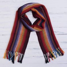 Bring the beauty of an Andean rainbow to your wardrobe with this scarf from Peru. Designed and handwoven of 100% alpaca by the talented artisans of the Ulloa Family the soft scarf features bright multicolored stripes along its length completed at the ends with fringes. Scarf Inspiration, Handmade Wool Scarf, Alpaca Shawl, Styles Hairstyles, Rainbow Scarf, Alpaca Scarf, Striped Scarf, Soft Scarf, Striped Scarves