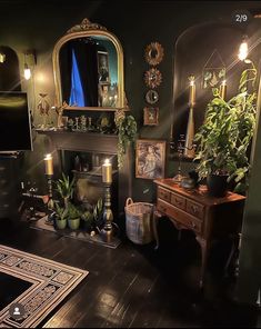 a living room filled with furniture and a fire place next to a mirror on the wall