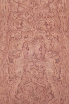 an image of wood textured in brown and tan tones with different patterns on it