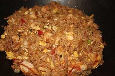 the food is prepared and ready to be cooked in the wok on the stove