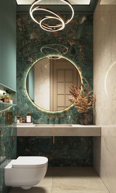 a bathroom with a round mirror above the sink and a white toilet in front of it