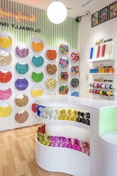 the inside of a candy shop with lots of colorful candies