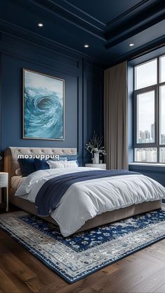 a bedroom with blue walls and wood flooring has a large painting on the wall