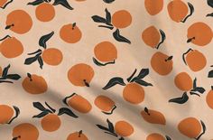 an orange and black pattern on a white background with measurements for the fabric to be cut in half