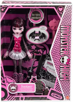 a doll in a pink and black outfit with a bat on it's head