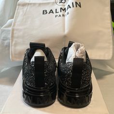 Balmain Slip On Sneakers With Box And Dust Bag Designer Black Patent Leather Sneakers, Black Leather Party Sneakers, Leather Low-top Sneakers For Evening, Evening Leather Low-top Sneakers, Designer Black Party Sneakers, Black Leather Evening Sneakers, Evening Black Leather Sneakers, Balmain Shoes, Black Leather Sneakers