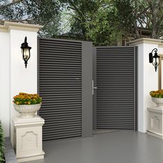 an open gate with two planters on either side and one potted planter in front