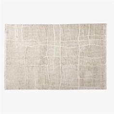 a white rug with lines on it