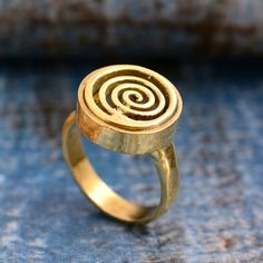 * Free Surprise Gift on Purchase of 1 Product. * Purchase of 4 Product and Get 2 Rings Free Gifts. Product :- Ring Material :- Brass Size :- All Size Available  Spiral Ring, Solid Brass ring, Thumb Ring, Thick Coil Ring, Wrap Ring, Swirl Ring, Statement Ring, Gift For Her, Handmade ring, Bohemian Ring * All our products are handmade and we make them as you see in the    photography but because of handmade There may be a slight difference in them * Handling Time: We take handling time of 1-3 Business Day from the date of receipt of the payment * Shipping Services: The shipping company takes 5-15 business days to deliver the product to US and most of other countries       For any queries Please feel free to message us. * Normally we respond in maximum 24 hours. * Gift packaging is available Gold Wire Ring, Thick Gold Ring, Coil Ring, Ring Wrap, Bohemian Ring, Spiral Ring, Swirl Ring, 2 Rings, Thumb Ring