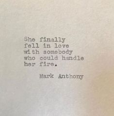 an old typewriter with the words, she finally fell in love with somebody who could handle her fire