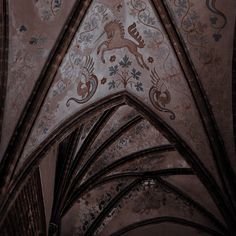 an intricately painted ceiling in a building