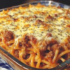 a casserole dish filled with meat and cheese