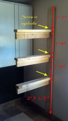 the height of some wooden shelves in a room with numbers on it and arrows pointing to them