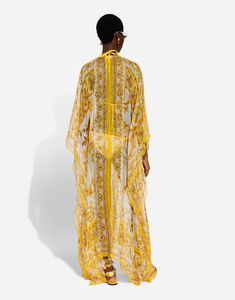 Long silk chiffon dress with majolica print: Yellow and White Round neck with ties Long kimono sleeves Unlined The piece measures 146 cm from the center back on a size IT 40 The model is 175 cm tall and wears a size IT 40 Made in Italy Majolica Print, Woman Dresses, Silk Chiffon Dress, Kimono Sleeves, Long Kimono, Kimono Sleeve, Silk Chiffon, Chiffon Dress, Print Dress