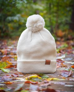 Wrap your loved ones in warmth and eco-friendly style with our charming beanie hat! 🌿 Crafted with love and sustainability in mind, this cozy accessory is the perfect gift for anyone who cares about our planet. 🎁 With its trendy design and eco-conscious materials, it's not just a hat--it's a statement. Order now and treat someone special to a gift that warms hearts and the Earth. Plus, enjoy our satisfaction guarantee for worry-free shopping! 🌟 Hurry, make a sustainable statement today! Casual Warm White Bonnet, White Warm Casual Bonnet, Cute Cream Hat For Gift, White Beanie Bonnet As A Gift, Warm Cream Beanie, One Size Fits Most, Warm White Cotton Hat, Cotton Winter Hat For Gift, Cotton Winter Hat As A Gift, Winter Cotton Hat As Gift